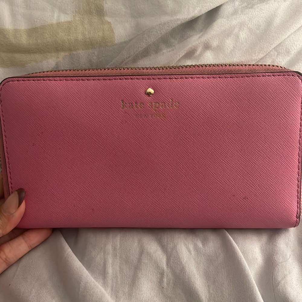 Kate spade pink wallet with many different compartments